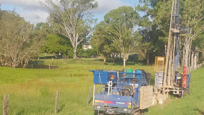 State government drilling rigs have moved in to put down surveying pegs at Eagleby south of Brisbane, stirring residents of an up-market over 50s resort who say the road is in the wrong place.