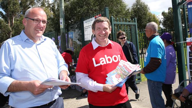 Labour Opposition Leader Luke Foley hands out how to vote cards on Saturday with Blacktown Mayor Stephen Bali.