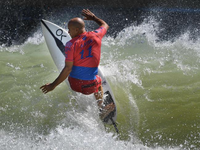 TOPSHOT - US' Kelly Slater surfs off the lip during the qualifying round of the WSL Surf Ranch Pro, at the Kelly Slater Surf Ranch in Lemoore, California on September 8, 2018. - The four-day event brings the worlds top surfers to compete on perfect machine-created waves in a half-mile long (.8kms) wave pool situated 100 miles (160.9kms) inland from the Pacific Ocean. (Photo by Mark RALSTON / AFP)