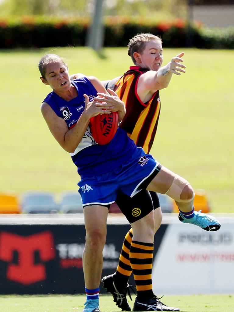 AFL Cairns Womens, Round 1: Manunda Hawks v Centrals Trinity Beach at Cazalys. Bulldogs' Kat Fatnowna and Hawks' Molly Taig. Picture: Stewart McLean