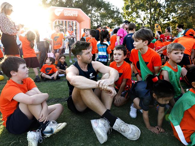 Toby Greene chats with junior players at Concord. Photo: Phil Hillyard