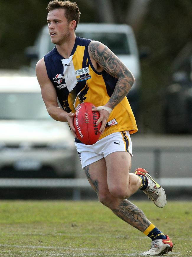 EFL: Beaconsfield’s Jack Docherty on the run. Picture: Hamish Blair