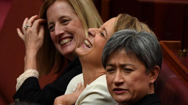 Senator Katy Gallagher, left, former senator Kristina Keneally, and senator Penny Wong in parliament in 2019. Picture: AAP