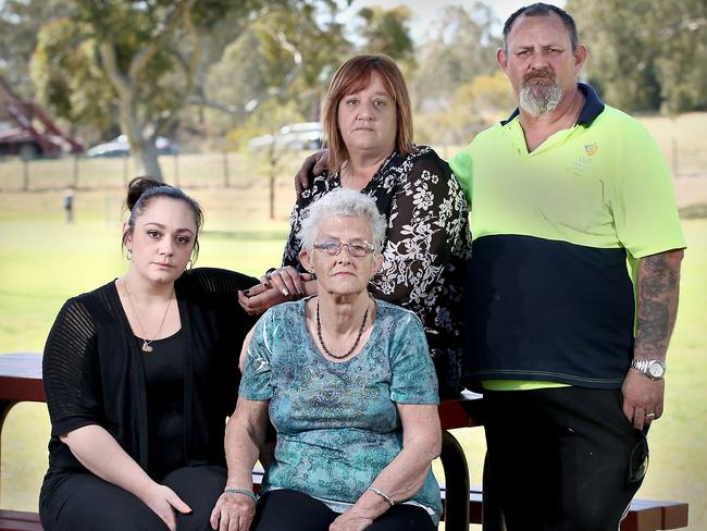 Beverley Hanley’s loved ones gathered at Carisbrooke Park to remember her in 2015 on the five-year anniversary of her murder — granddaughter Tasha Chase, daughter Robyn Schaefer, son Rob Hainsworth and long-term friend Gloria West. Picture: Mike Burton