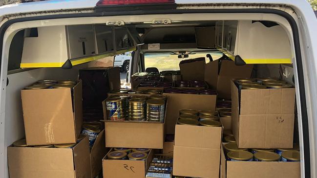 Thousands of baby formula tins seized by police. Picture: NSW Police