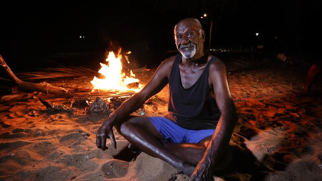 Joseph Bosuen, 59, cooks up a freshly caught fish and oysters. Picture: David Caird