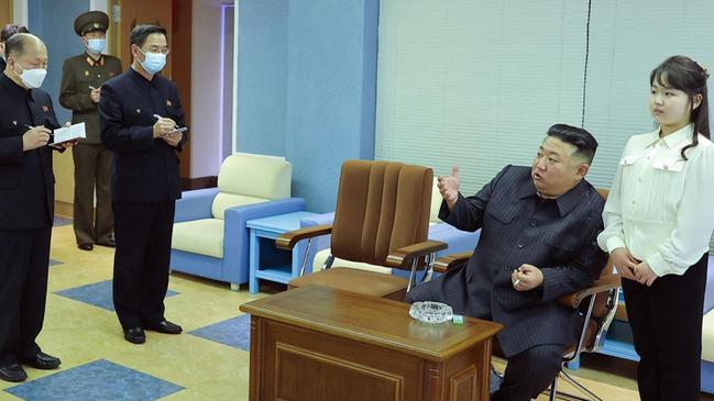 Kim Jong-un and his daughter inspecting the National Aerospace Development Administration. Picture: STR/Getty Images/The Times