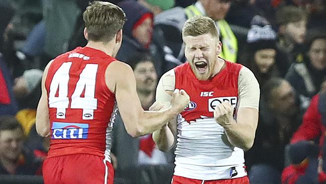 Jake Lloyd and Dan Hannebery celebrate after the siren. Picture: Sarah Reed