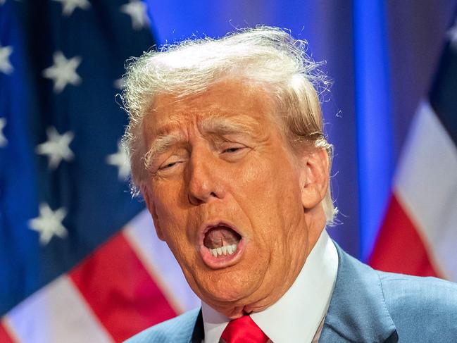 US President-elect Donald Trump gestures as he attends a meeting with House Republicans at the Hyatt Regency hotel in Washington, DC on November 13, 2024. (Photo by Allison ROBBERT / AFP)