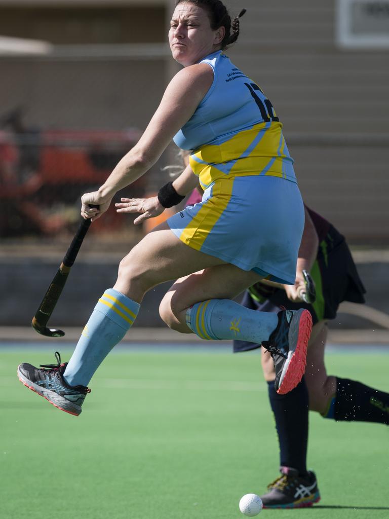 Tanya Lesina of Cairns 1 leaps in the game against Redlands 1.