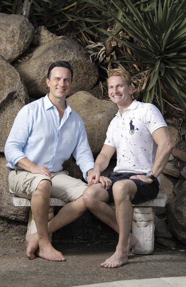 U on Sunday socials editor Damien Anthony Rossi and his fiance Jason Avery at their Ferny Hills home. The pair were engaged earlier this month and are planning a 2020 wedding. Picture: Mark Cranitch.