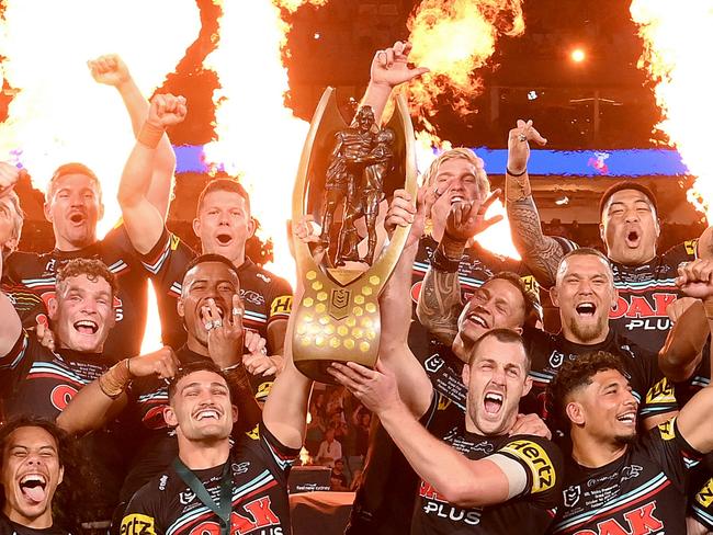 SYDNEY, AUSTRALIA - OCTOBER 01: The Panthers players celebrate victory as the hold up the premiership trophy after the 2023 NRL Grand Final match between Penrith Panthers and Brisbane Broncos at Accor Stadium on October 01, 2023 in Sydney, Australia. (Photo by Bradley Kanaris/Getty Images)