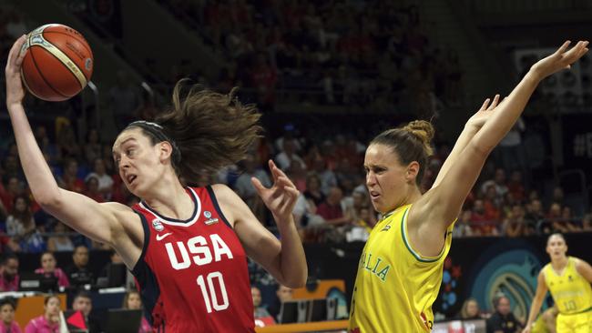 Breanna Stewart of the United States, left, jumps to shoot as Steph Talbot of Australia defends. Picture: AP Photo