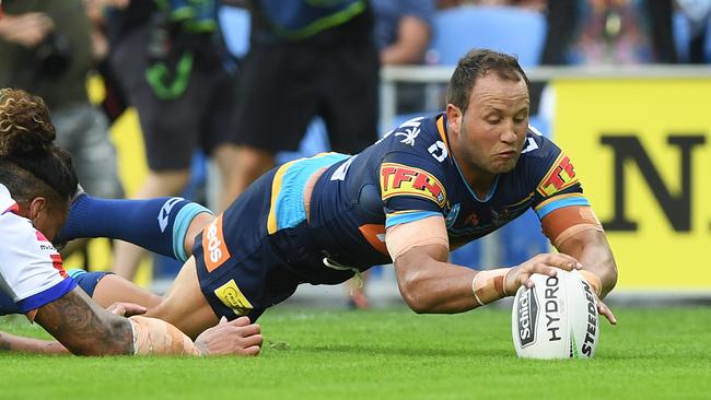 Tyrone Roberts starred in the Titans win over the Knights. (AAP Image/Dave Hunt) 