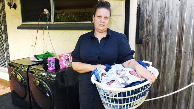 Sewage overflow victim Brittany Giudes at her Wulguru home. Picture: Shae Beplate.