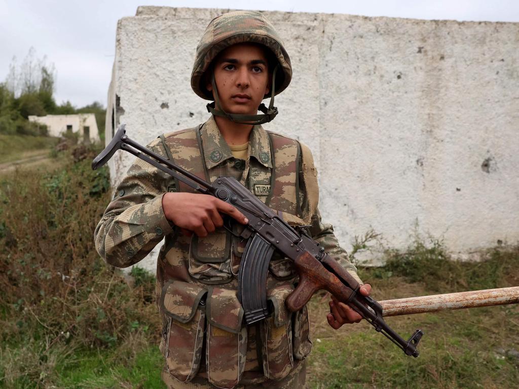 A Azerbaijani soldier stands guard at an Azerbaijan forces' base in Shusha, in Azerbaijan's controlled region of Nagorno-Karabakh. Picture: AFP