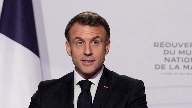 French President Emmanuel Macron delivers a speech after visiting the National Maritime Museum (Musee national de la Marine), the day of its reopening after six years of renovation, in Paris, on November 27, 2023. (Photo by Christophe Ena / POOL / AFP)