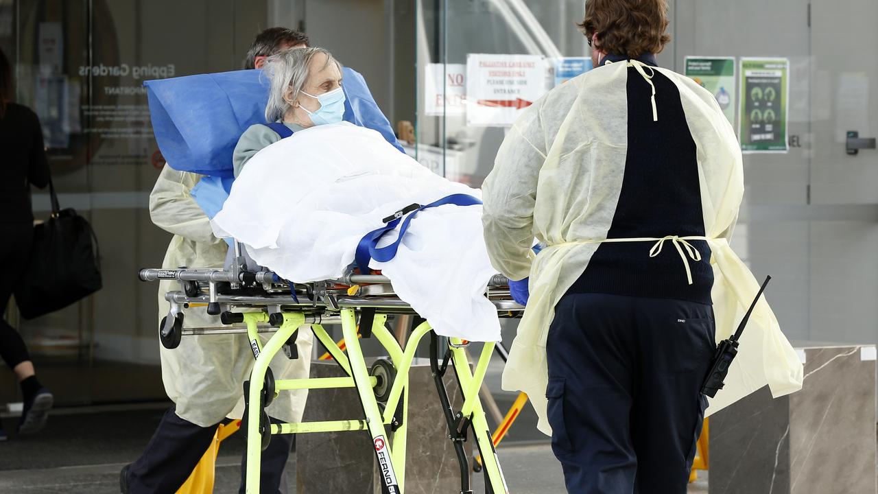 A resident of Epping Gardens Aged Care Facility is taken away in an ambulance on July 28. Picture: Darrian Traynor/Getty Images