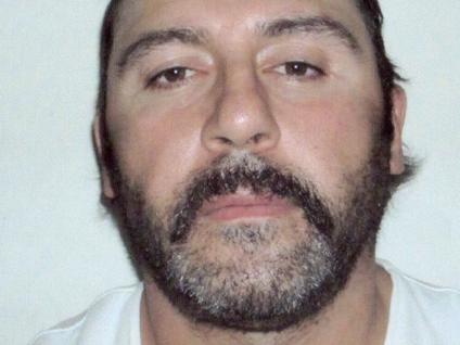 Police supplied pictures of Tony Mokbel and the passport he was travelling under.