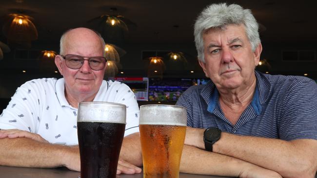 Punters Bruce Harrington and John John discuss the recent booze tax hike. Picture Glenn Hampson