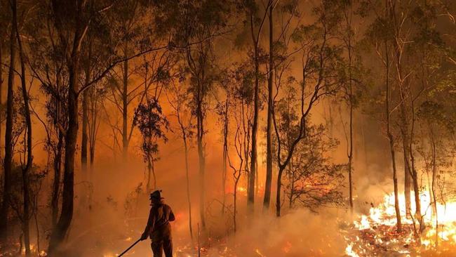 The Pechey/Ravensbourne fire has remained a concern today despite some rain falling across the south-east..CREDIT-Facebook: QFES, Hugh Strong