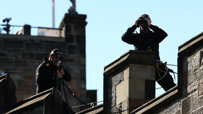 Police officers overlook proceedings. Picture: Getty Images