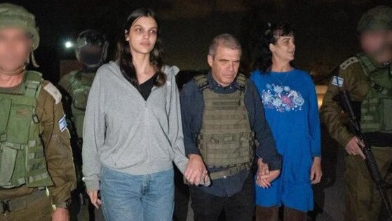 In this handout photo provided by the Israeli government, American hostages Judith Tai Raanan and her 18-year-old daughter, Natalie Raanan, are seen following their release on Friday. Picture: Handout/Israeli Government