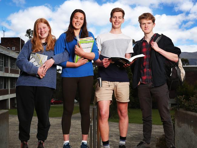 Hobart College students, from left, Jaymi Jenkins, 17, Kate Poynter, 18, Joel Verdouw, 18, and Ben Poortenaar, 18, after completing their chemistry exam. Picture: Nikki Davis-Jones