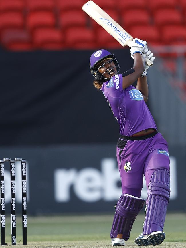 Hurricanes' Hayley Matthews smashes down the ground during the WBBL match between the Sydney Sixers and Hobart Hurricanes at the Sydney Showground. Picture: Phil Hillyard