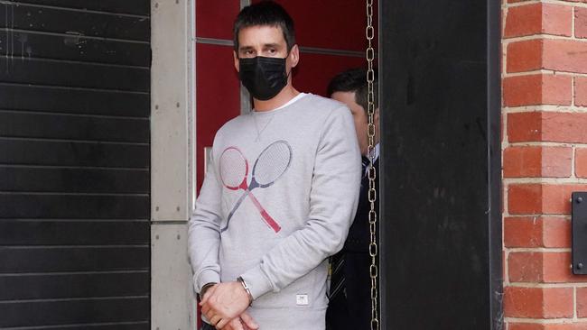 Pusey is taken away from his Fitzroy property by police in Melbourne on April 23. Picture: AAP Image/Michael Dodge