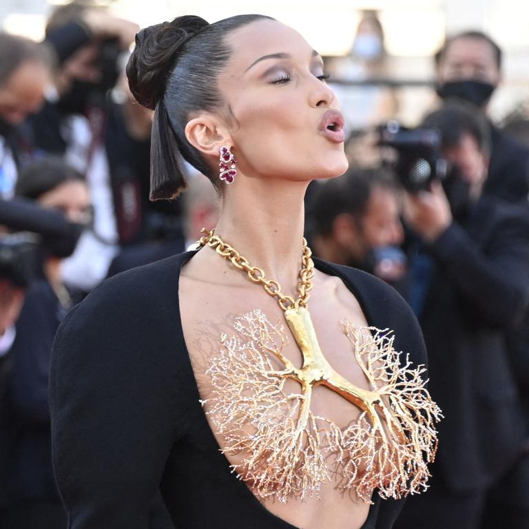 Bella Hadid Stuns With Incredible Gold-Dipped Lungs Look at Cannes Film  Festival 2021, 2021 Cannes Film Festival, Bella Hadid