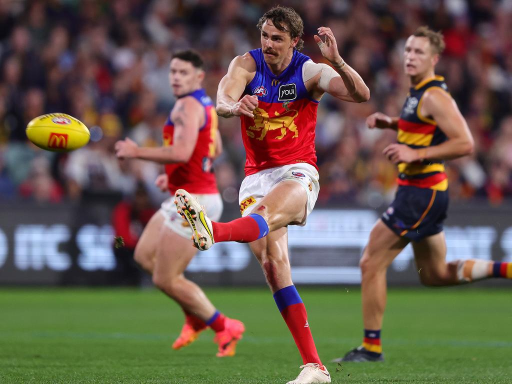 ADELAIDE, AUSTRALIA - MAY 12: Joe Daniher of the Lions kicks a goal during the 2024 AFL Round 09 match between the Adelaide Crows and the Brisbane Lions at Adelaide Oval on May 12, 2024 in Adelaide, Australia. (Photo by Sarah Reed/AFL Photos via Getty Images)