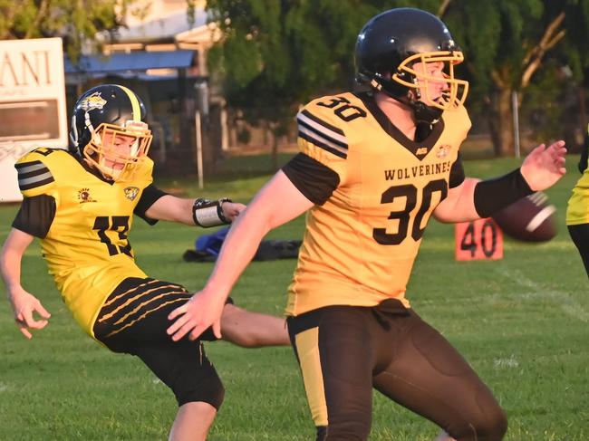 Running back Jack Grayson (number 30) has been huge for the Rockhampton Wolverines in this campaign. Photo: George Vartabedian