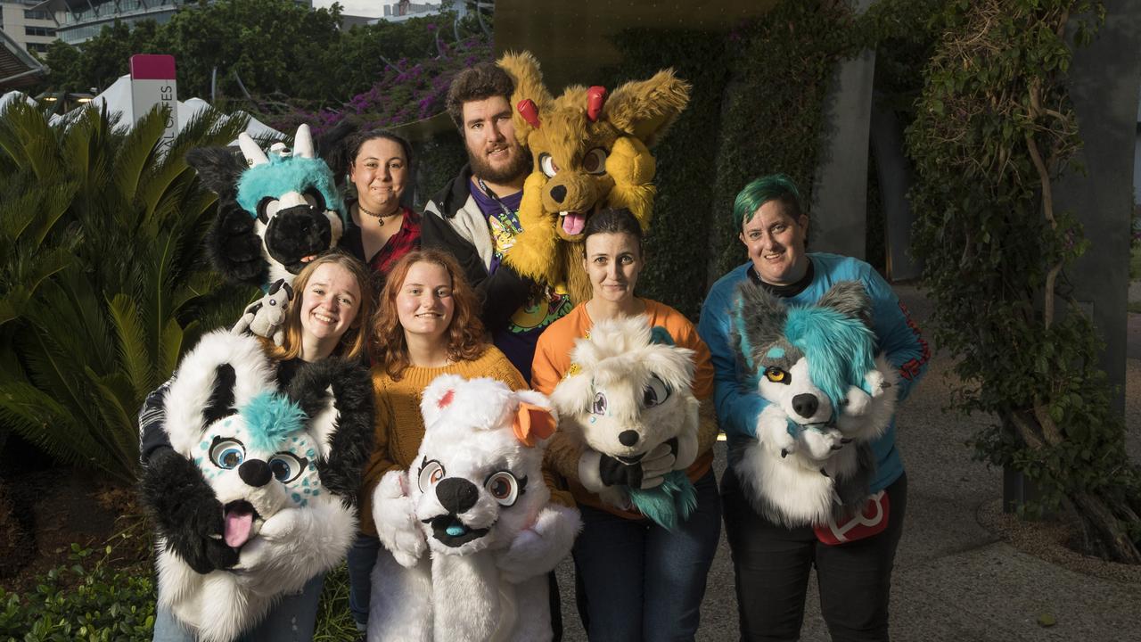 Unmasked: A group of furries, including Gabi, aka Skye, on the left, gather together to celebrate the furdom. Picture: Mark Cranitch