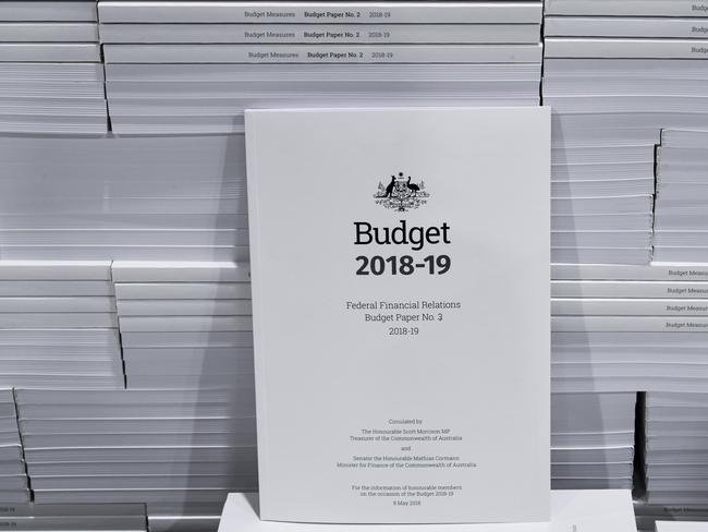 The cover of the 2018-19 Budget papers is seen at Canprint in Canberra, Sunday, May 6, 2018. Australia's Treasurer Scott Morrison will deliver his third Budget on Tuesday, May 8. (AAP Image/Lukas Coch) NO ARCHIVING