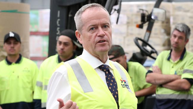 Bill Shorten talks to workers at the Port of Brisbane yesterday. Picture: Liam Kidston