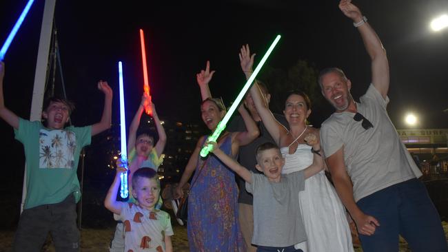 Sarah Heron, Erin Macvicar, Andrew Macvicar, Rhys Heron and children celebrating New Year's Eve 2022 at Mooloolaba. Photo: Elizabeth Neil