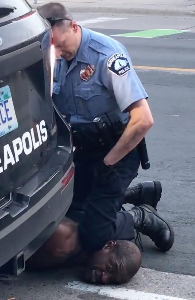 Minneapolis police officer Derek Chauvin arresting George Floyd.