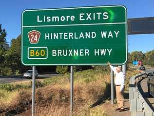 Thomas George unveils Lismore highway sign on Pacific Highway.