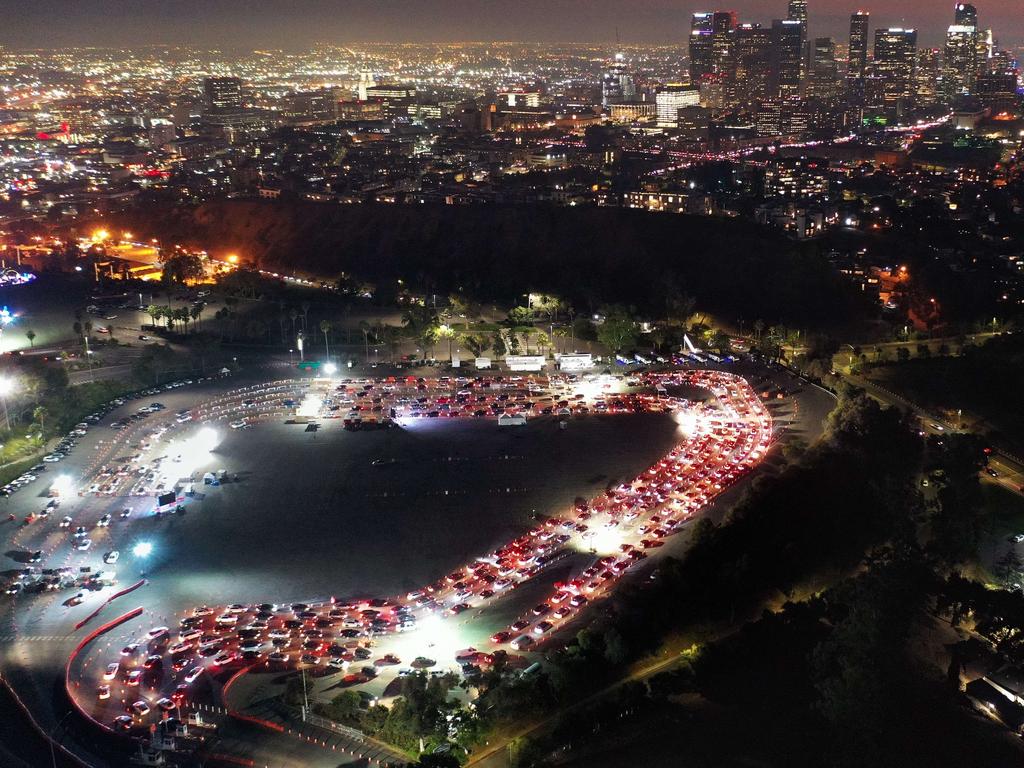 Cars line up at Dodger Stadium for COVID-19 testing in Los Angeles, California where there is an emergency order for people ‘to remain in their homes’. Picture: AFP