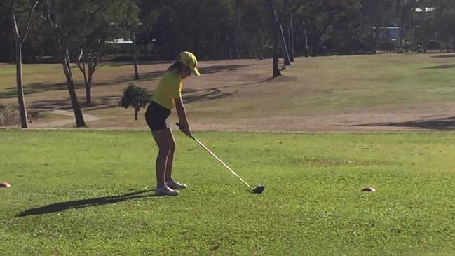 Linzi McBean swings down fairway