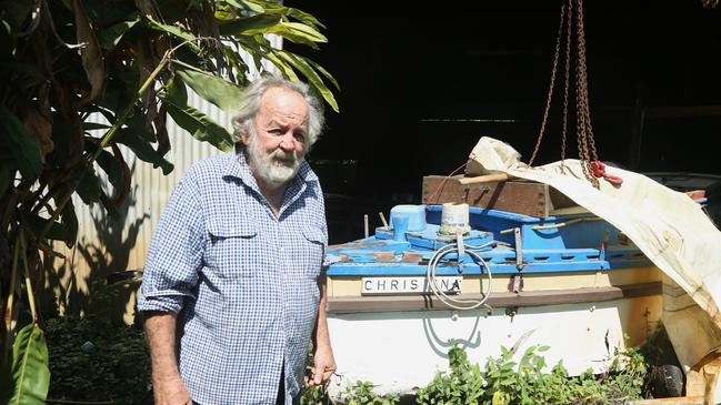 Richie Britten at his East Russell home surrounded by boat projects and memories from a bygone era. Picture: Peter Carruthers