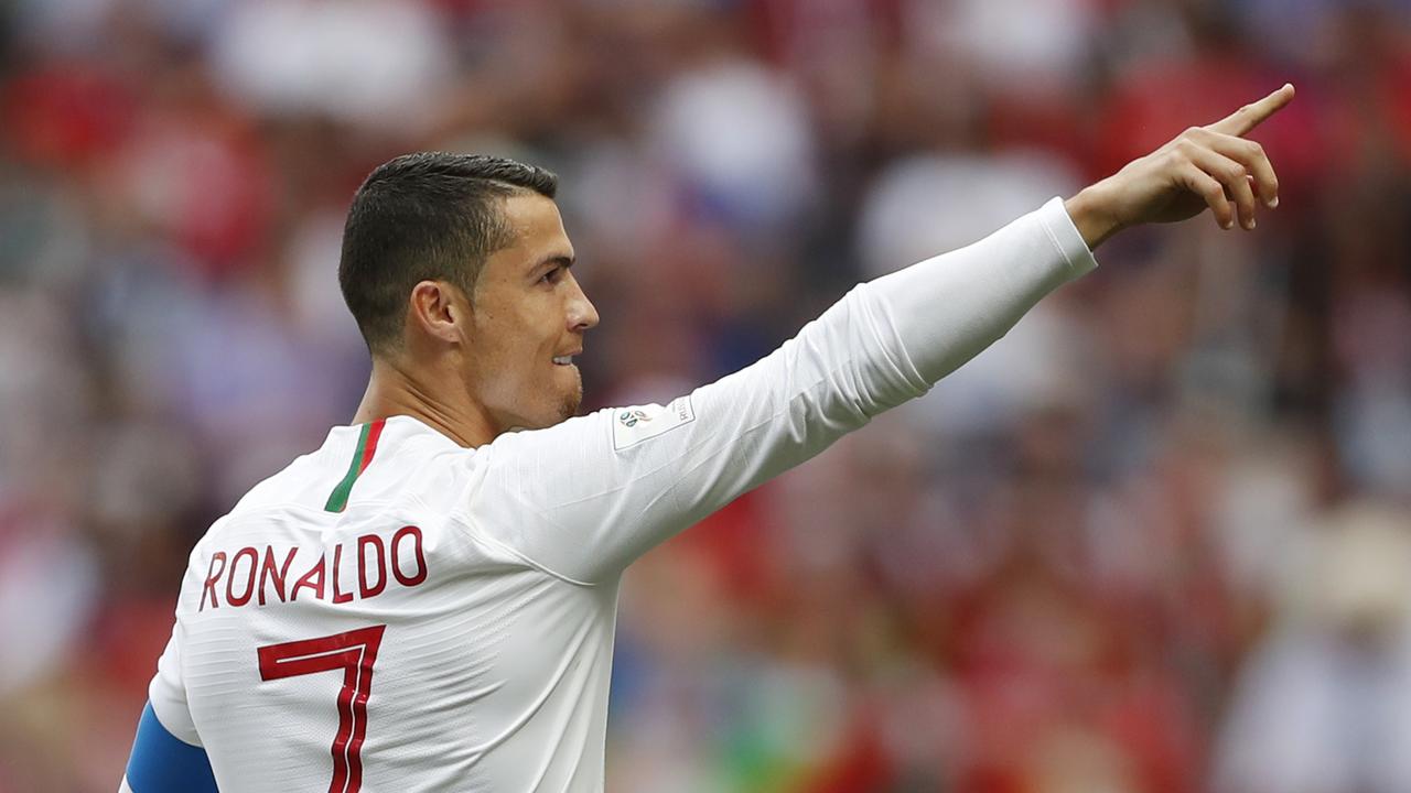 Portugal's Cristiano Ronaldo celebrates after scoring the opening goal against Morocco.