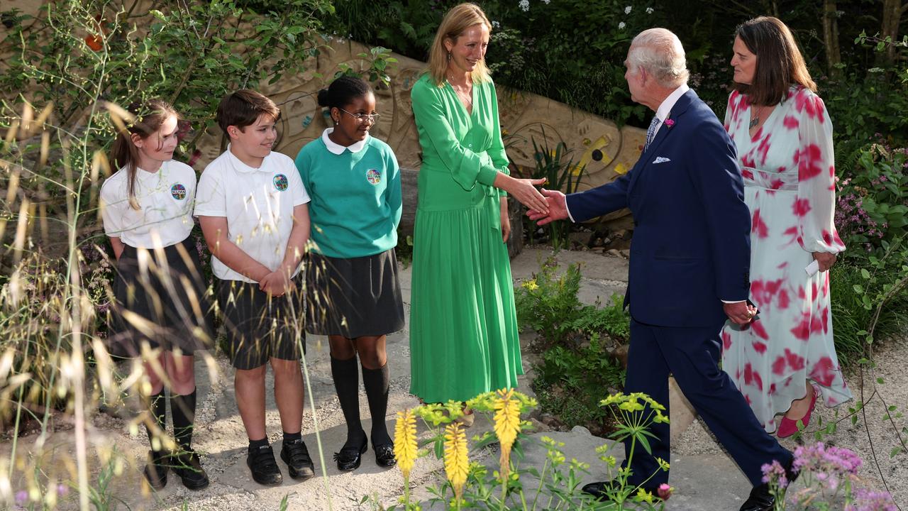 Head teacher of the Sulivan Primary School Wendy Aldridge greets King Charles III with pupils of the school. Picture: Adrian Dennis/WPA Pool/Getty Images
