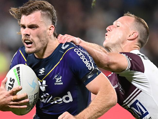 SUNSHINE COAST, AUSTRALIA - SEPTEMBER 10: Ryan Papenhuyzen of the Storm is tackled by Daly Cherry-Evans of the Sea Eagles during the NRL Qualifying Final between the Melbourne Storm and the Manly Warringah Sea Eagles at Sunshine Coast Stadium on September 10, 2021, in Sunshine Coast, Australia. (Photo by Bradley Kanaris/Getty Images)