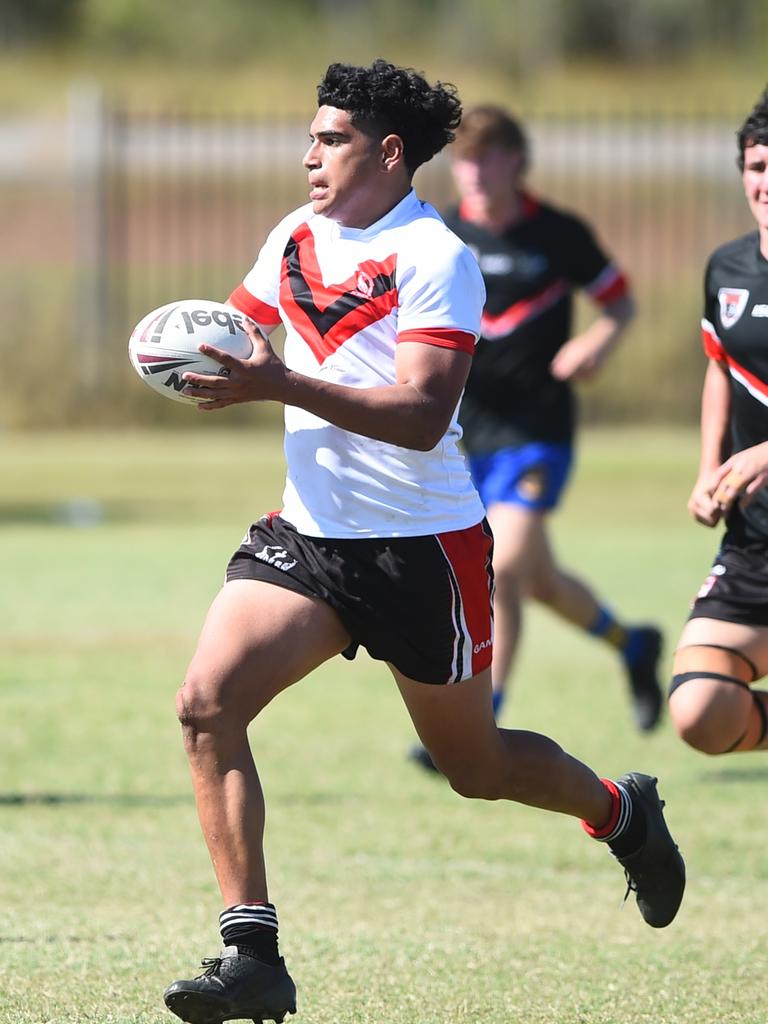 Boys Rugby League State Championship held at Northern Division, Brothers Leagues ground, Townsville. South West (black) v Wide Bay (white). 16-18 years. Noah Law of Shalom College.