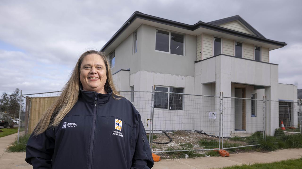 Natasha Child works for the SES as a project manager in the operational communications department. She says she would not have been able to get back into the property market after her divorce if not for Villawood Properties’ Care Worker Support program. Picture: Wayne Taylor.