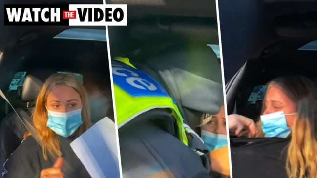 Dramatic moment woman is pulled from her car at a police checkpoint