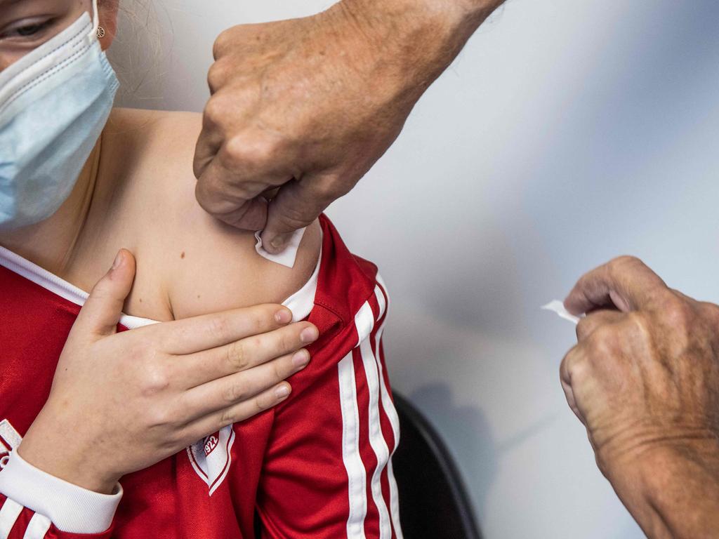 Children aged five to 11 who receive the jab can expect to experience similar side effects to adults who received Pfizer, according to the TGA. Picture: by Olafur STEINAR GESTSSON / Ritzau Scanpix / AFP