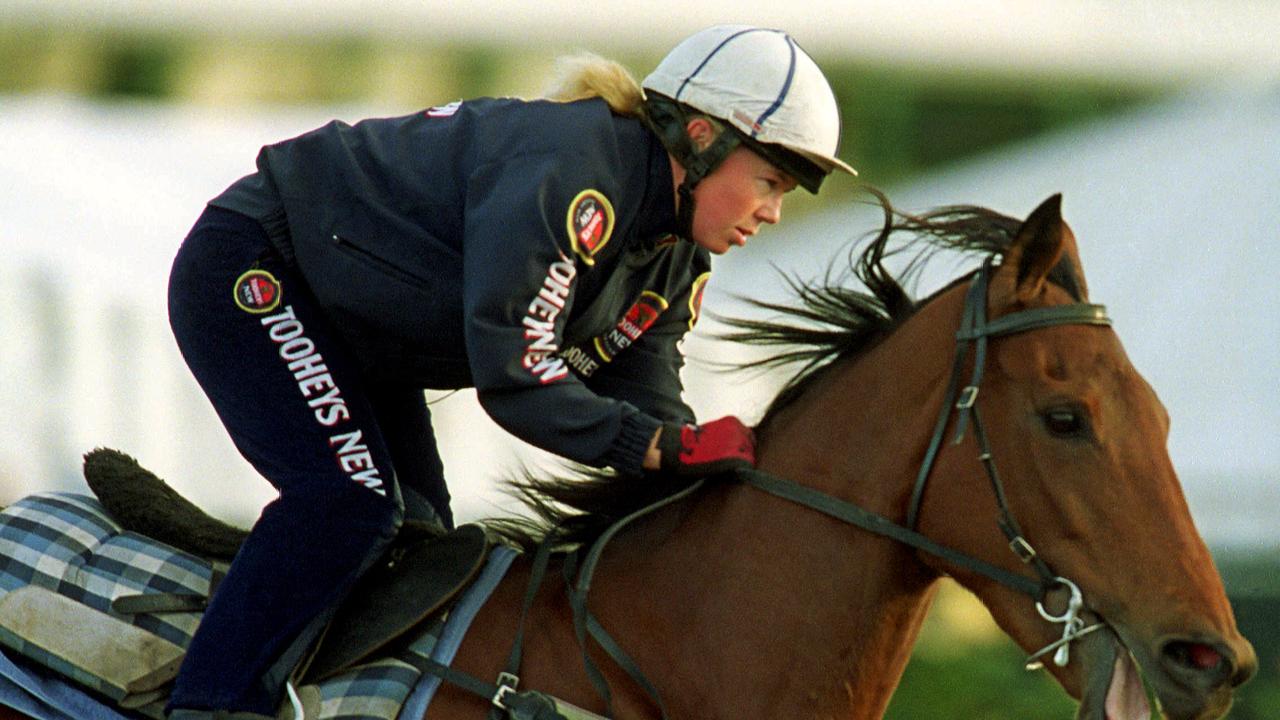 Racehorse Sunline and minder Claire Bird at trackwork at Flemington 25 Oct 2001.